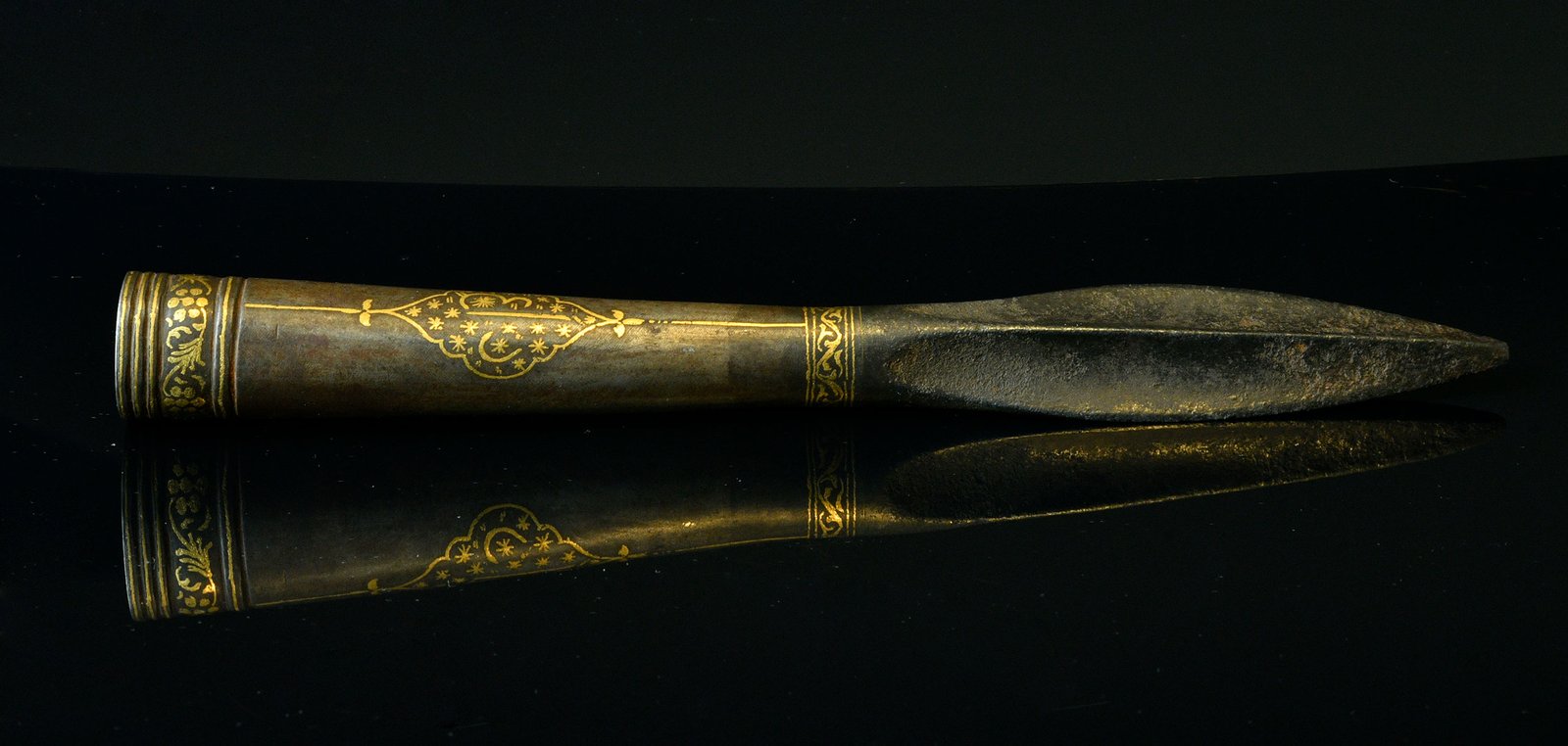 Islamic spearhead with gold work on bronze.